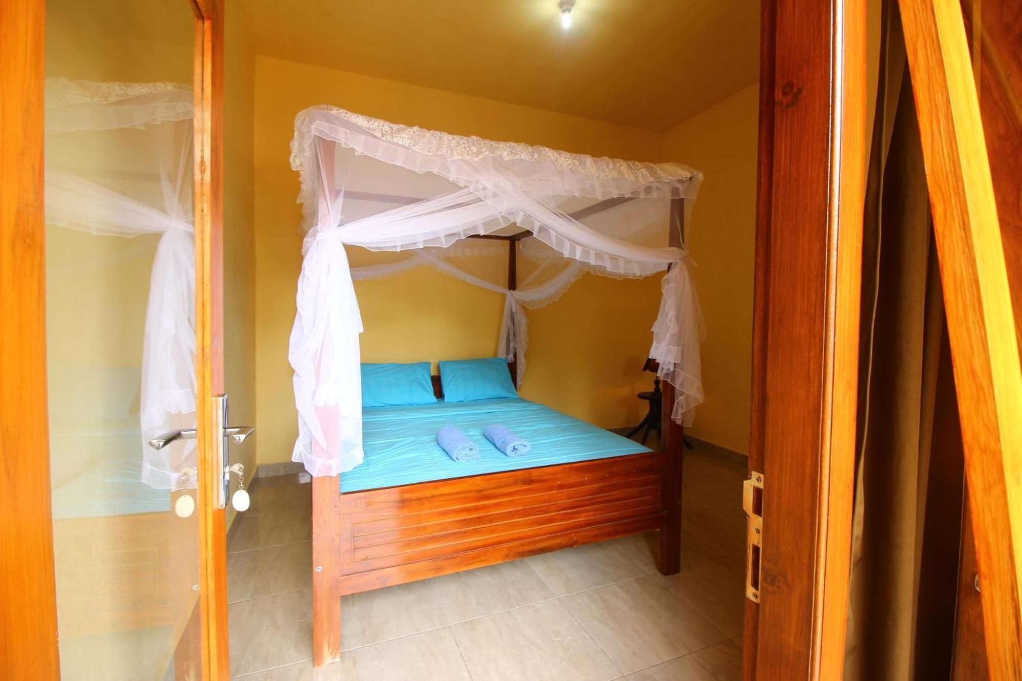 Edy Homestay มุนดุก ห้อง รูปภาพ